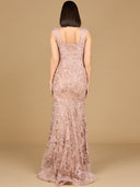 A sleeveless mermaid lace embroidered gown with a v-neckline, in a blush color, with a  train.