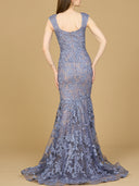 A sleeveless mermaid lace embroidered gown with a v-neckline, in a blue gray color, with a train.