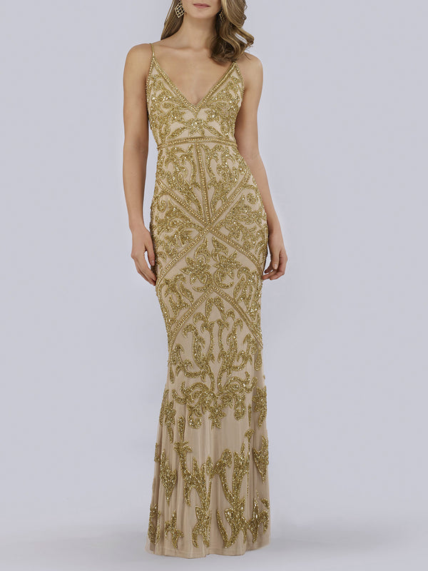 A woman wears the Lara 29744 Spaghetti Strap Beaded Dress, featuring a fitted silhouette, ornate gold bead and sequin patterns, a deep V-neckline, floor-length skirt with sweep train, and her hair styled in soft waves over one shoulder.