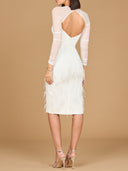A stunning Back pose of white dress made sheer mesh and feathers, highlighting a whimsical and sophisticated style.