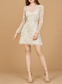 Woman wearing a beige lace dress with long sleeves on a beige background