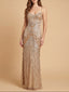 Woman wearing a sparkly gold evening gown against a beige background