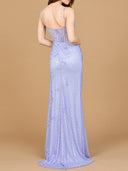A model elegantly wears a lavender evening gown with a thigh-high slit, capturing a chic and glamorous look.